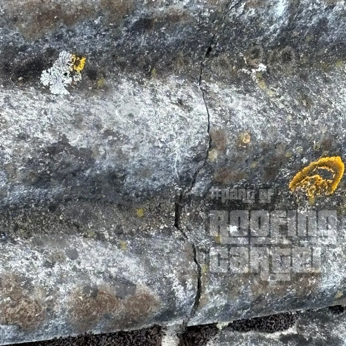 Cracked asbestos roof requiring repair