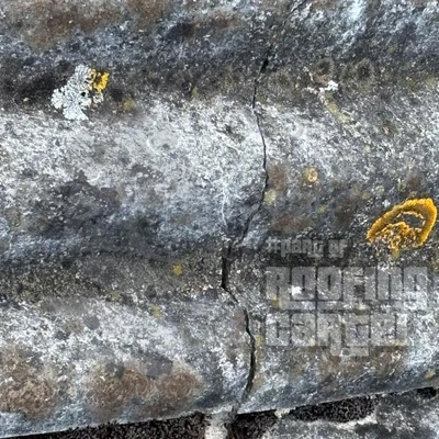 Cracked asbestos sheets