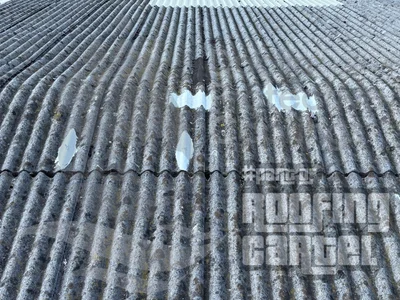 Completed Lava 20 patch repair on asbestos roof demonstrating UV stable finish