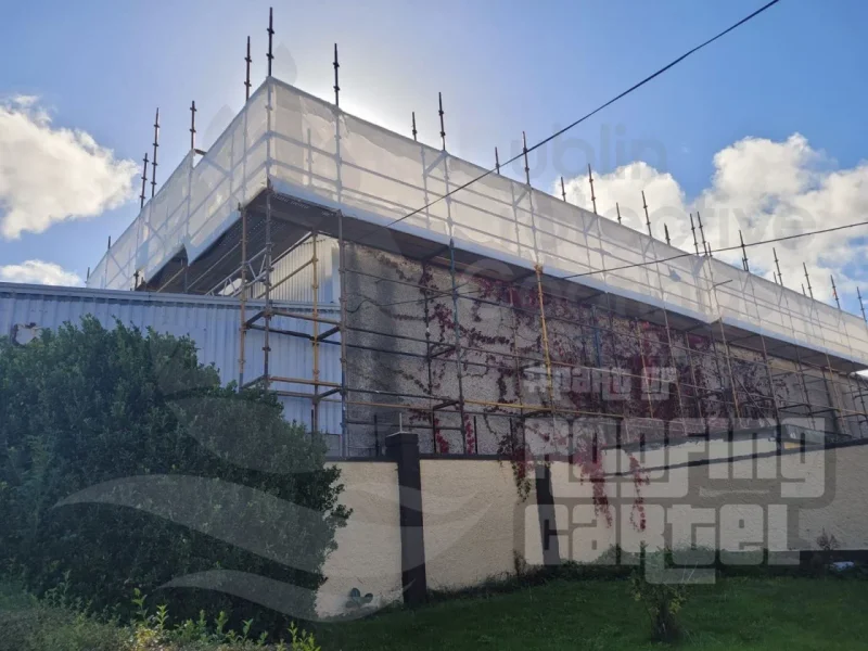 Polyurea waterproofing coating applied to industrial warehouse asbestos roof in Dublin